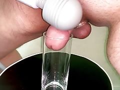 Smallish Penis Masturbating With A Palm Massager And Spunking In A Glass